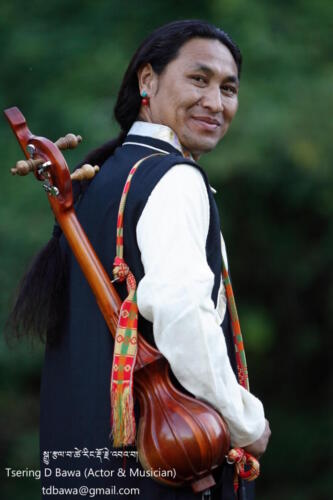 Tsering D.bawa with his lute copy